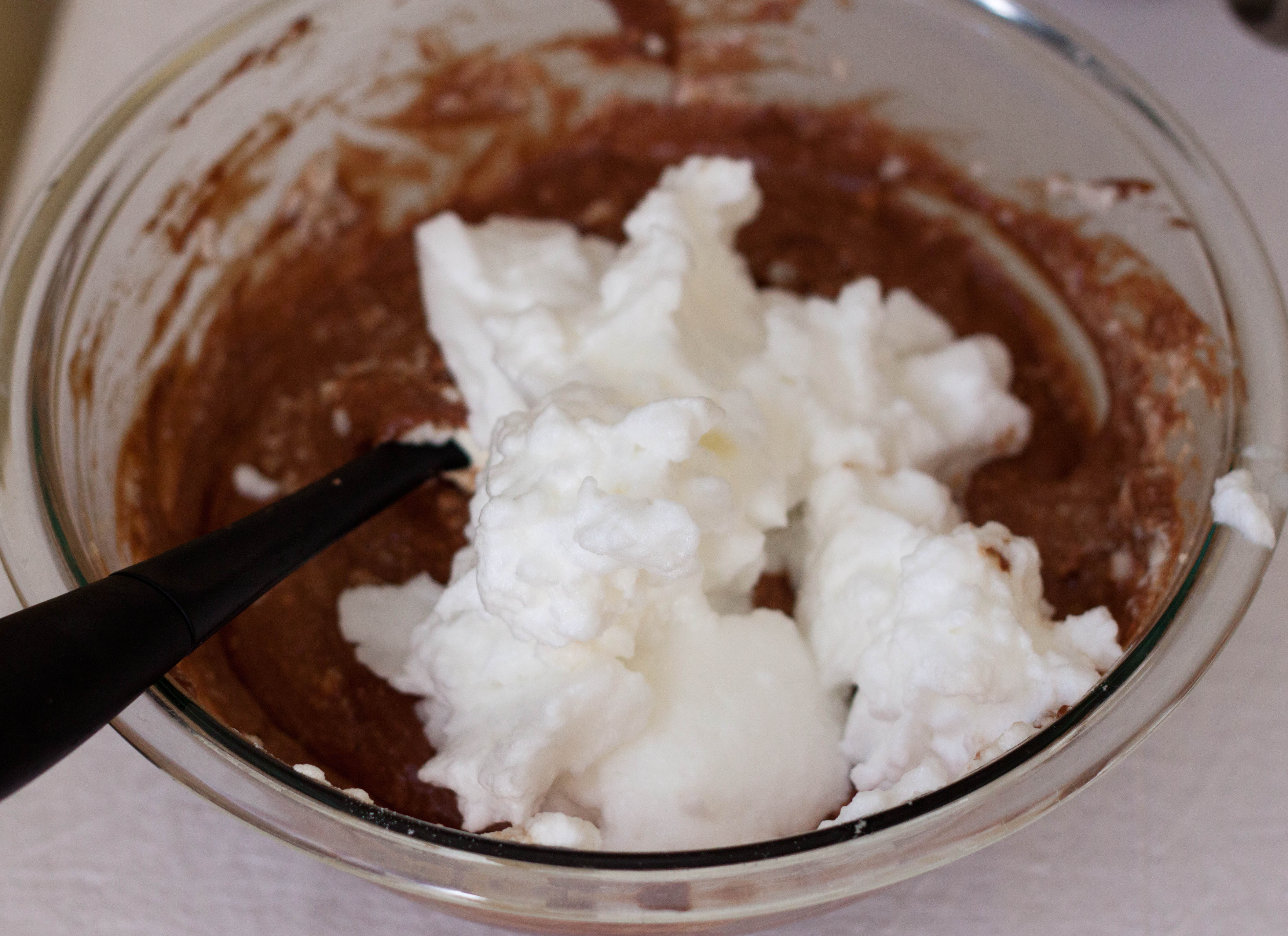 Add stiff egg whites to chocolate:egg yolks