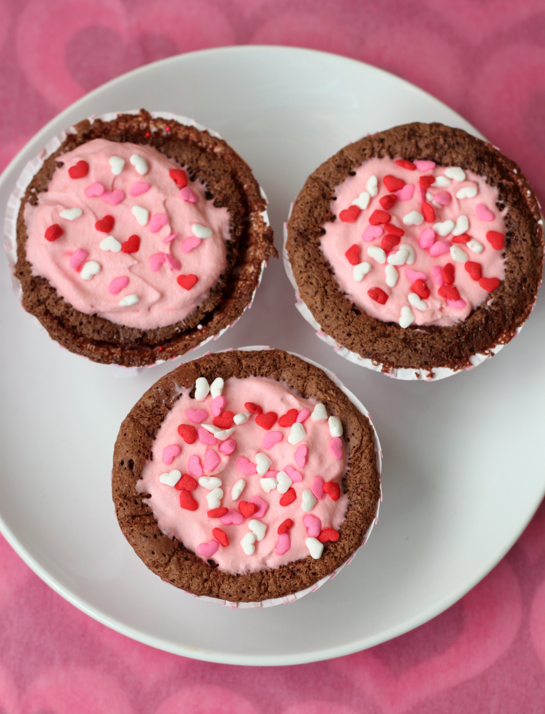 Flourless chocolate cupcakes with pink whipped cream 2