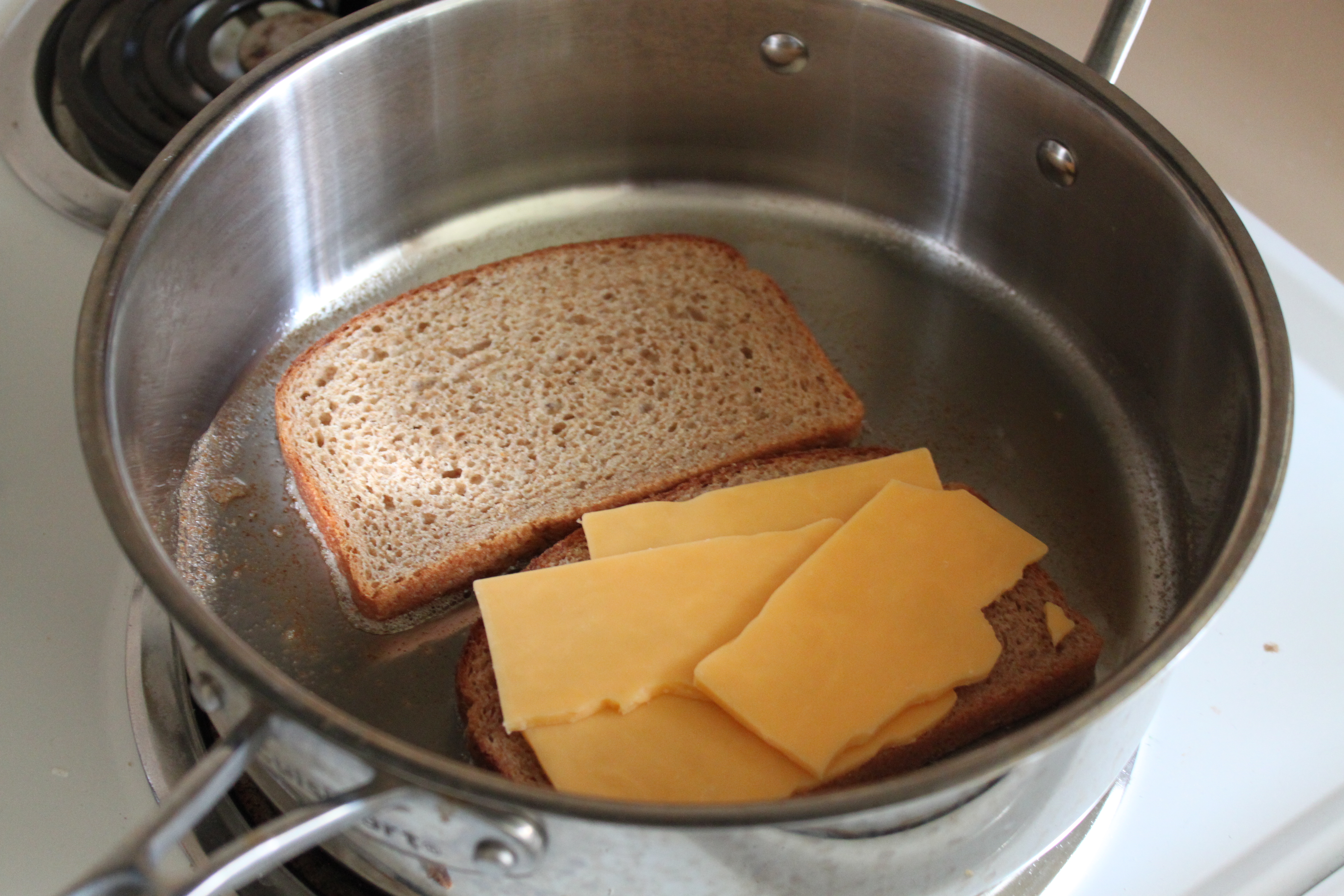 Add cheese to bread