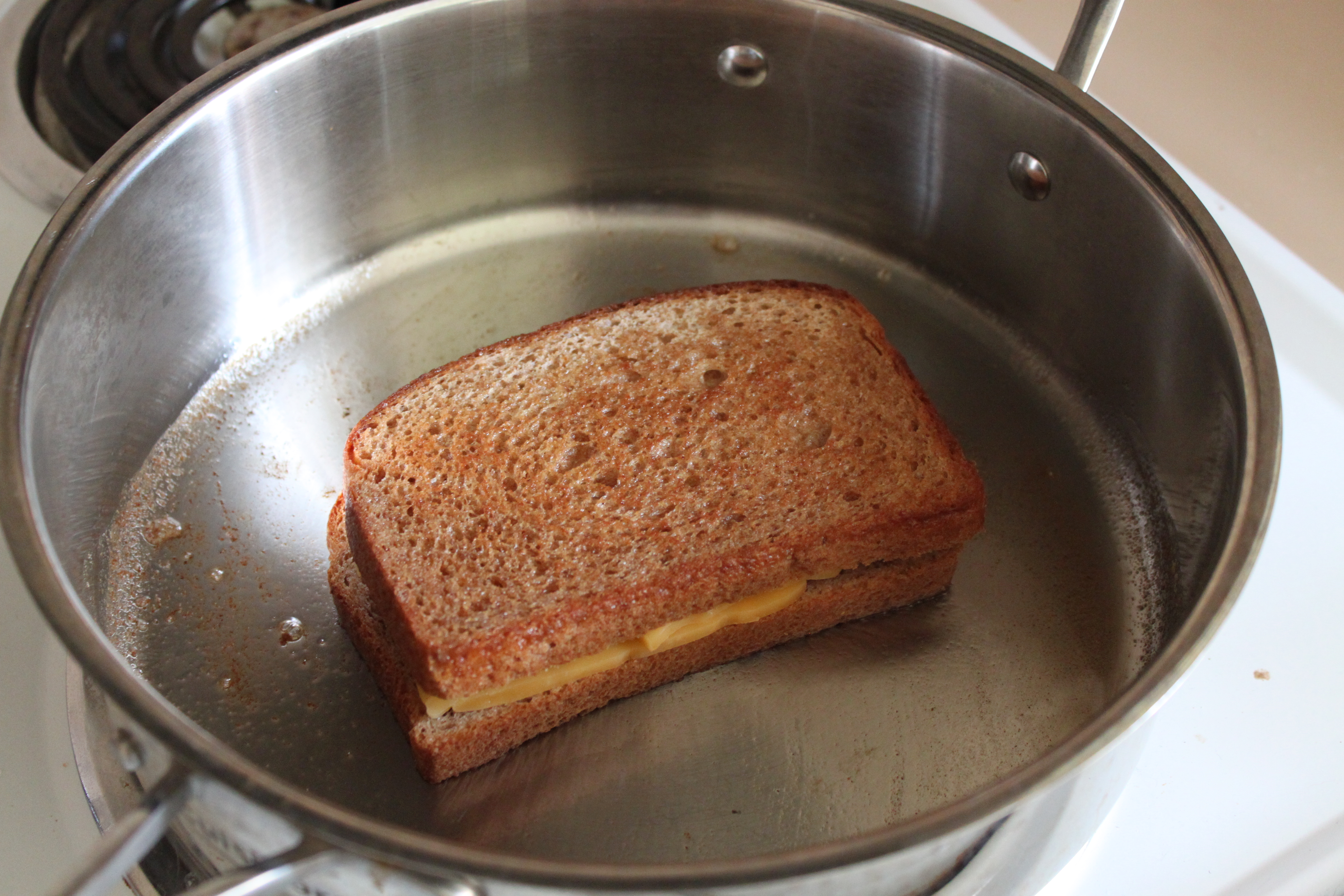 Move toasted bread on top of cheese